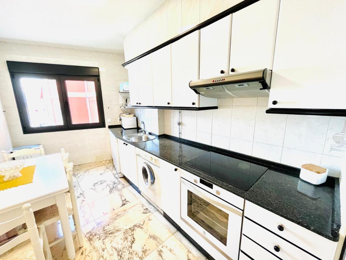 Apartamentos Faro Da Rocha O Grove Esterno foto